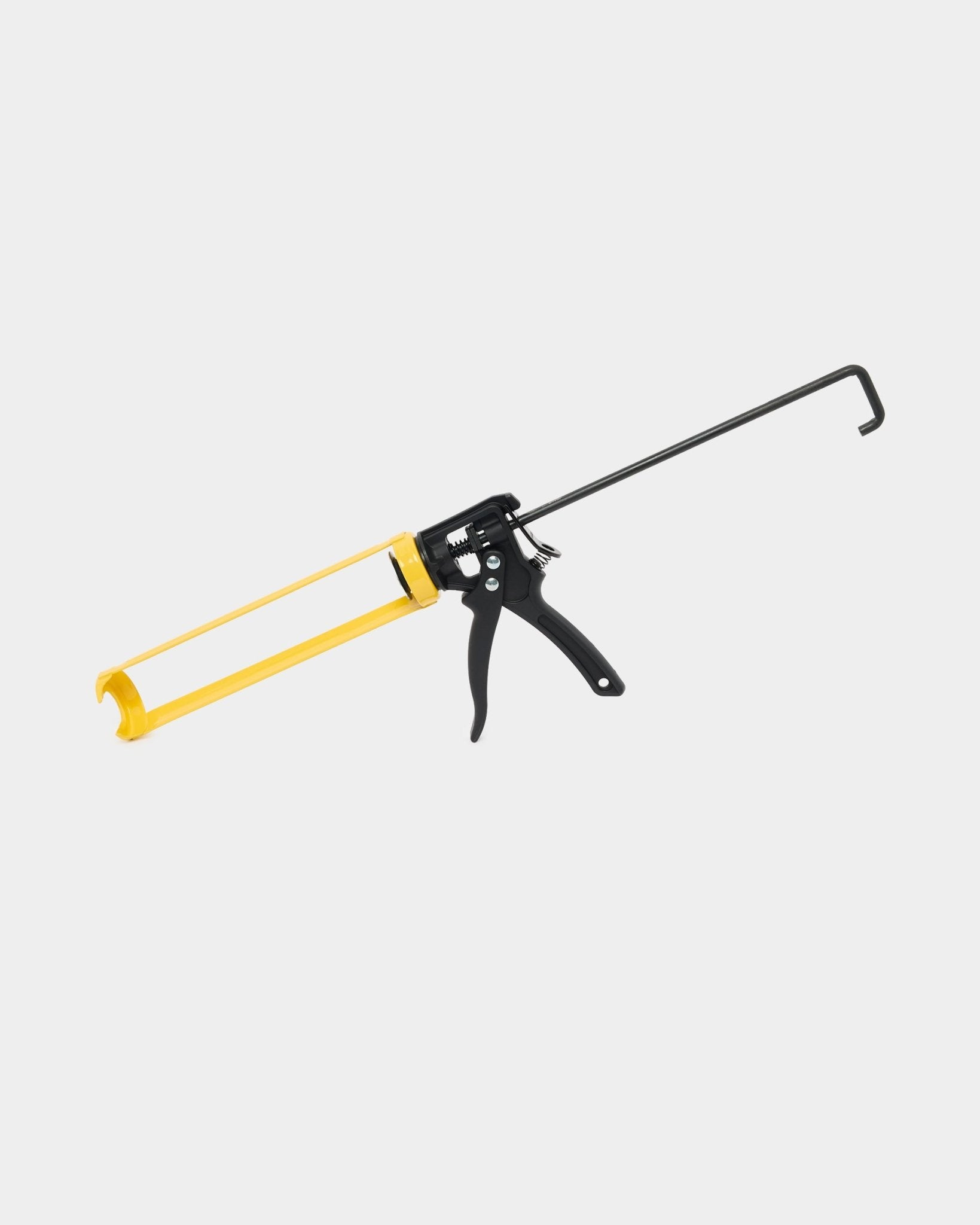 WoodUpp Grout Gun (290 ml) do montażu Akupanel, z żółtym i black metalowym uchwytem oraz spustem, używany do dozowania kleju montażowego do paneli akustycznych.